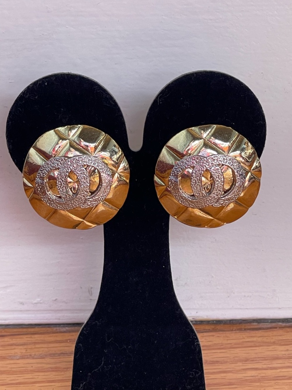 Gold-Tone Button Clip On Earrings with Silver-Tone Interlocking Circle Emblem